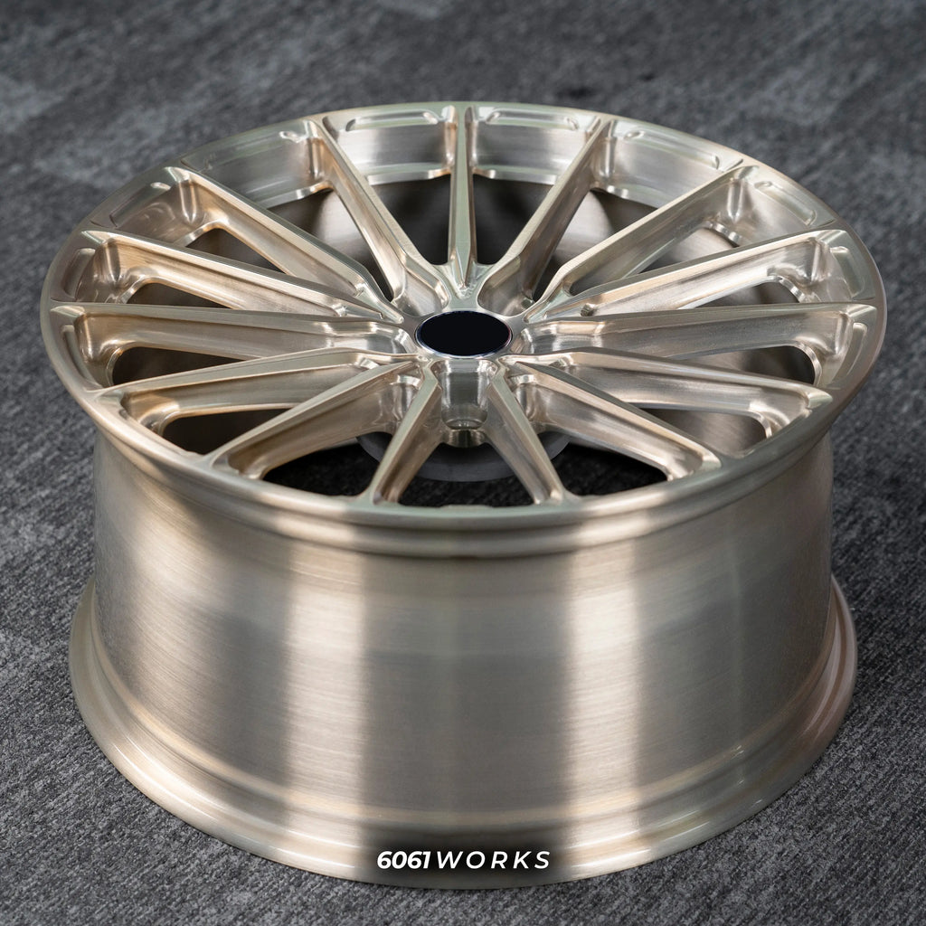 Audi RS E-TRON GT FW 21 inch custom forged wheels | P103SC style Brushed with Gold coating finish, top-down angled profile view showing full wheel width and inner barrel