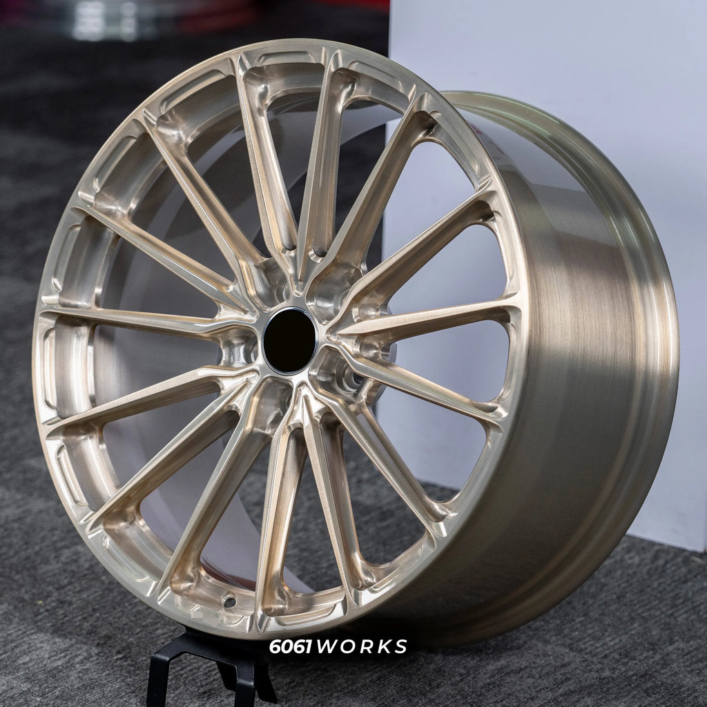 Audi RS E-TRON GT FW 21 inch custom forged wheels | P103SC style Brushed with Gold coating finish, dynamic side-angle view displaying concave profile and brushed gold luster