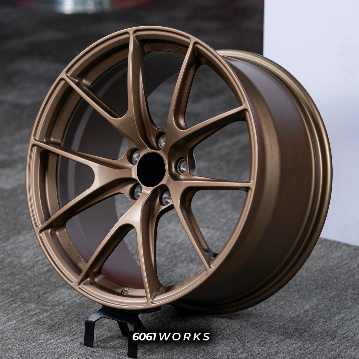 Audi RS3 8Y 18 inch custom forged wheels | Apex VS-5RS style Satin Bronze finish, dynamic side-angle view displaying deep concave profile and satin bronze coat