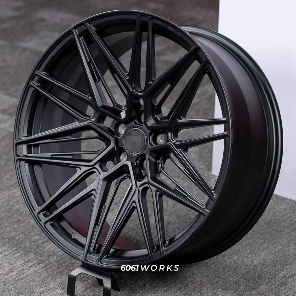 Audi RS6 C8 22 inch custom forged wheels | Vossen HF-7 style Satin Black, angled display view on grey studio background