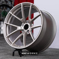 BMW M5 Touring G99 22 inch custom forged wheels | OEM BMW 763M style Satin Gold finish, three-quarter view on display stand showing lightweight performance Y-spoke geometry