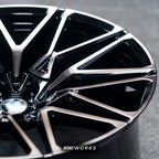 BMW X6 G06 22 inch custom forged wheels | OEM BMW 818M style Gloss Black with Machined Face Dark Coating, detailed close-up shot of the outer lip and machined edge under direct lighting