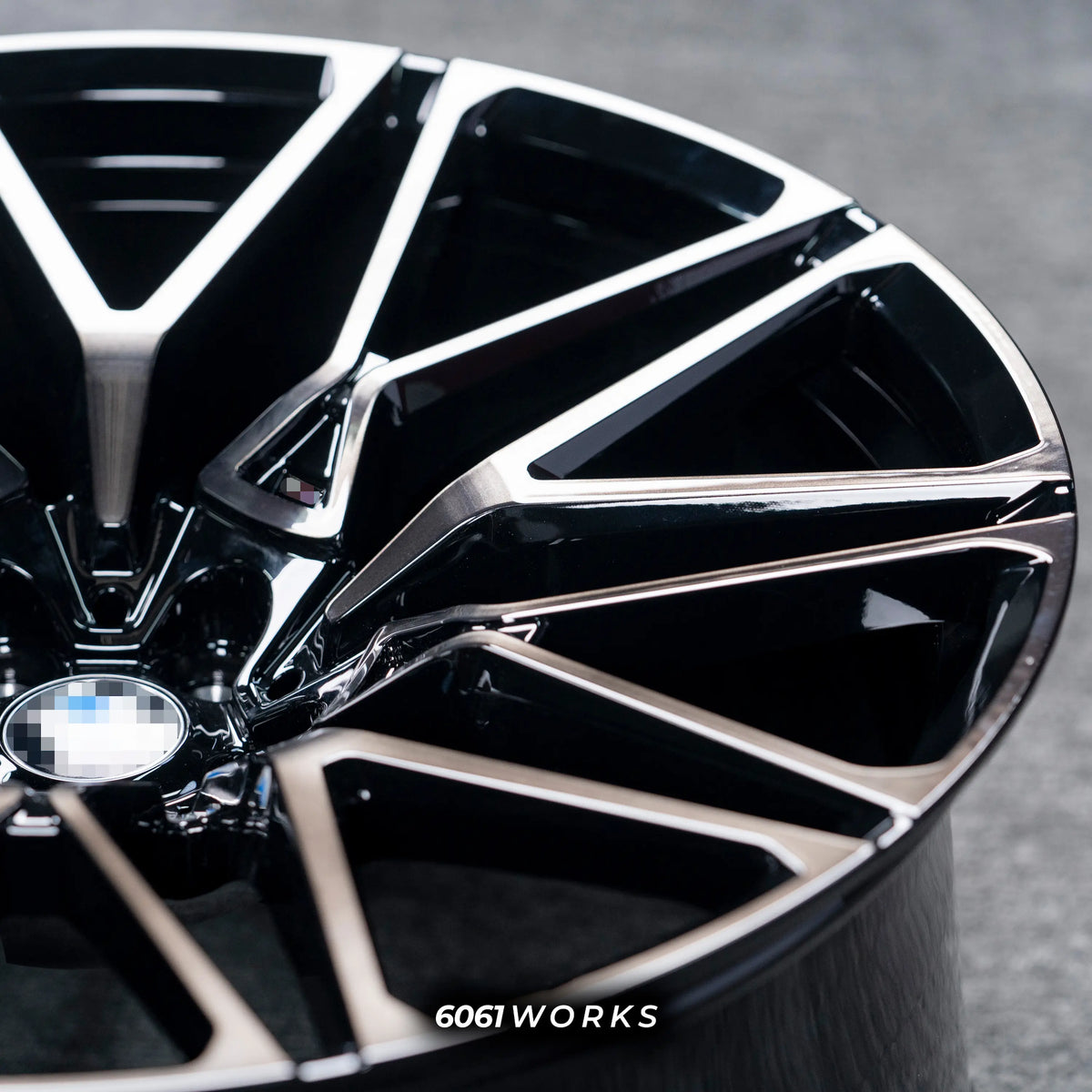 BMW X6 G06 22 inch custom forged wheels | OEM BMW 818M style Gloss Black with Machined Face Dark Coating, detailed close-up shot of the outer lip and machined edge under direct lighting