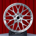 BMW X6M F96 F96 LCI 21 22 inch custom forged wheels | 520M style Brushed Silver finish, straight front view on display stand showcasing complex performance split-spoke pattern