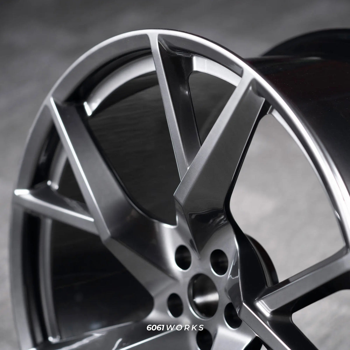 Ferrari 296 GTB 21 22 inch custom forged wheels | Mansory YN.5 style Satin Gunmetal, close-up view on spoke construction and lip