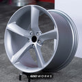 Ferrari 488 20 inch custom forged wheels | OEM Ferrari Monza SP1 style Satin Silver finish, dynamic side-angle view showing sleek monoblock structure and elegant metallic sheen