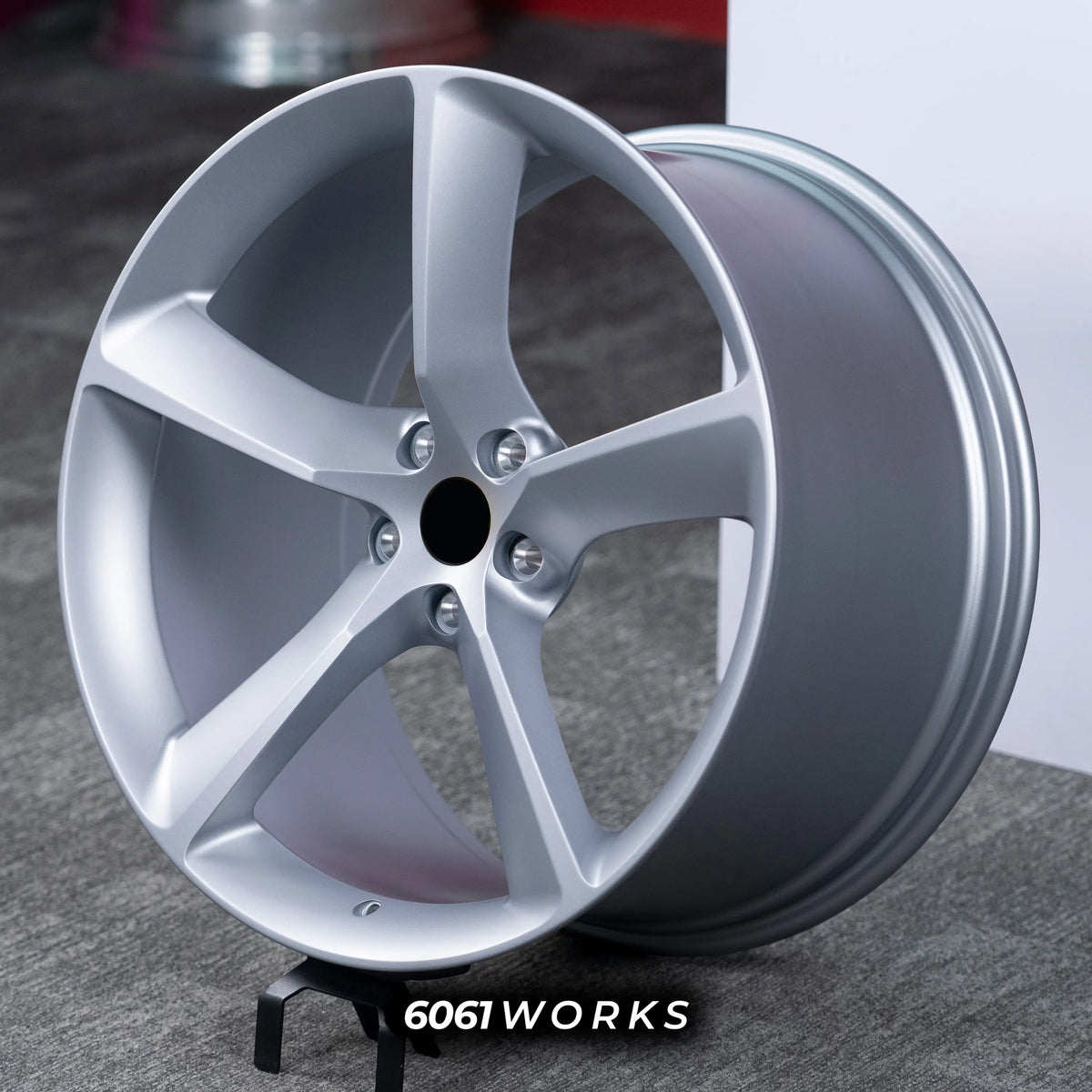 Ferrari 488 20 inch custom forged wheels | OEM Ferrari Monza SP1 style Satin Silver finish, dynamic side-angle view showing sleek monoblock structure and elegant metallic sheen