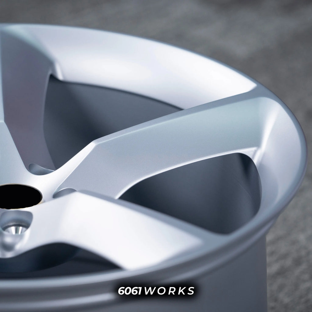 Ferrari 488 20 inch custom forged wheels | OEM Ferrari Monza SP1 style Satin Silver finish, detailed close-up shot of outer rim lip and smooth spoke contour under soft studio lighting