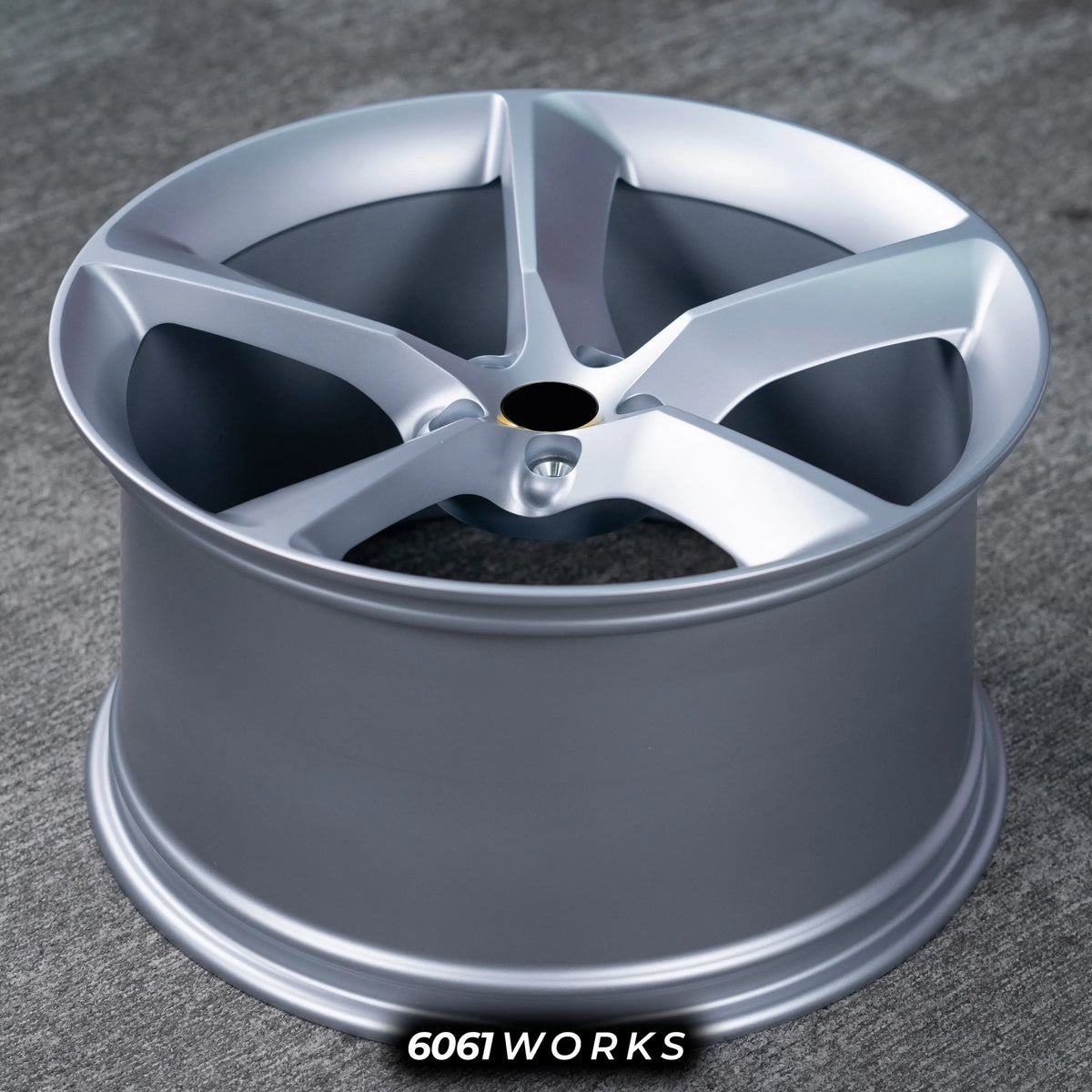 Ferrari GTC4Lusso 21 22 inch custom forged wheels | OEM Ferrari Monza SP1 style Satin Silver finish, top-down angled profile view showing full wheel width, inner barrel, and clean 5-spoke geometry