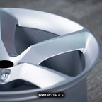 Ferrari Purosangue 22 23 inch custom forged wheels | OEM Ferrari Monza SP1 style Satin Silver finish, detailed close-up shot of outer rim lip and smooth spoke contour under soft studio lighting