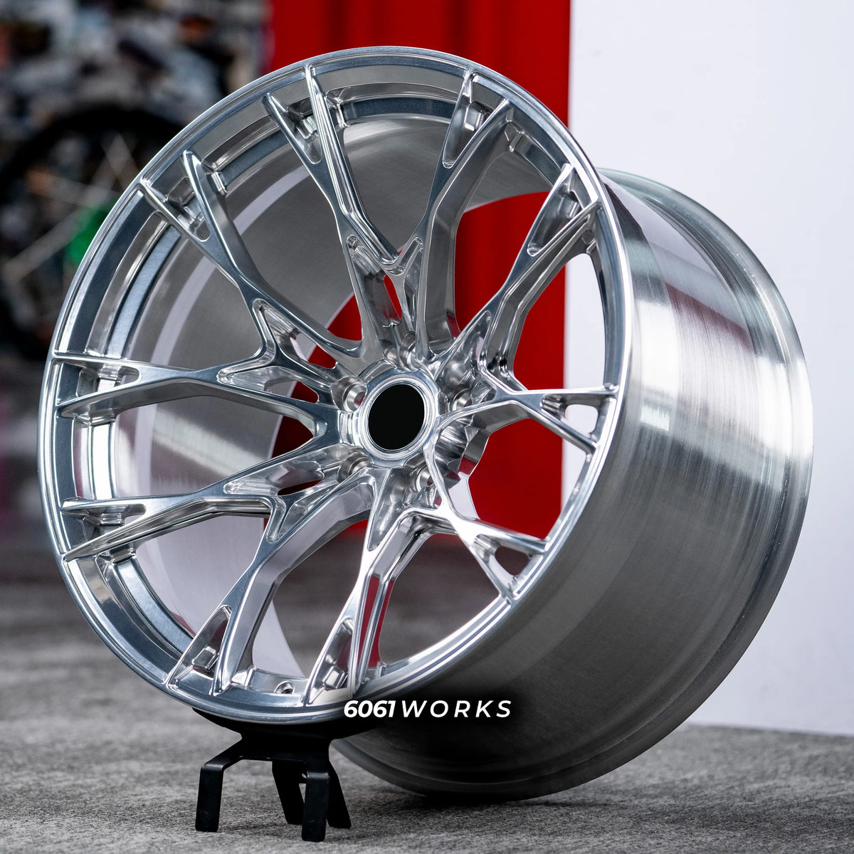 Porsche 911 992.1 Carrera 20 21 inch custom forged wheels | Sternthal ST9 style Polished finish, angled view on backdrop accentuating high-gloss mirror-polished aluminum surface