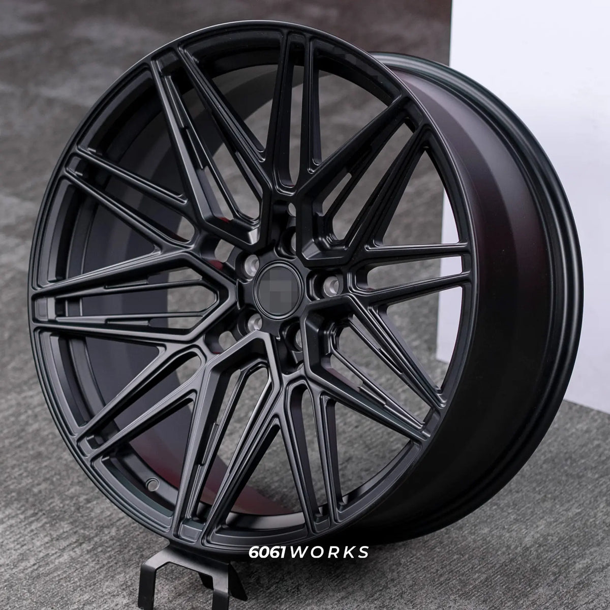 Porsche Cayenne GTS 9Y Facelift 23 inch custom forged wheels | Vossen HF-7 style Satin Black, angled display view on grey studio background