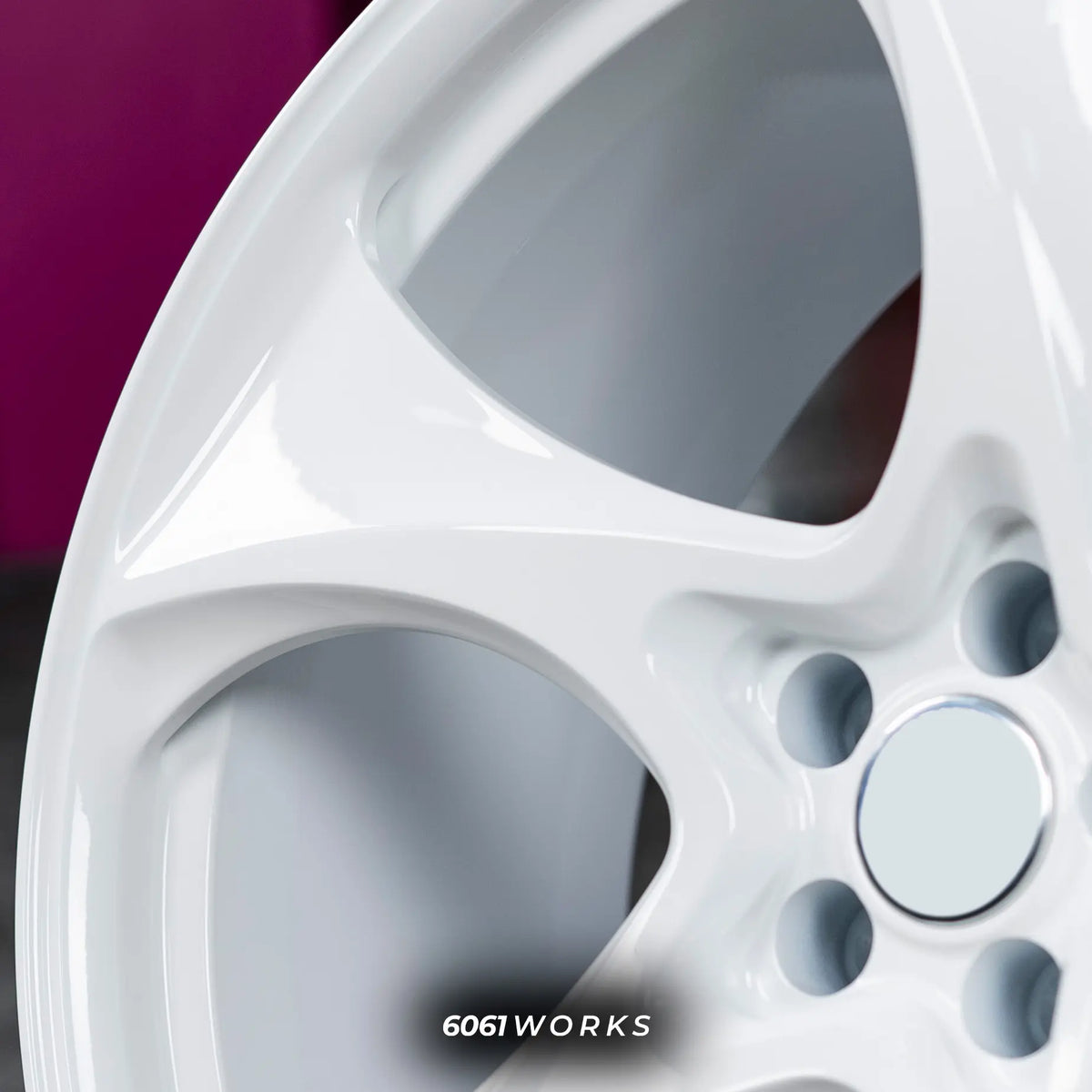 Porsche Taycan 21 inch custom forged wheels | 522M style Gloss White, close-up view on sweeping spoke geometry and center cap area