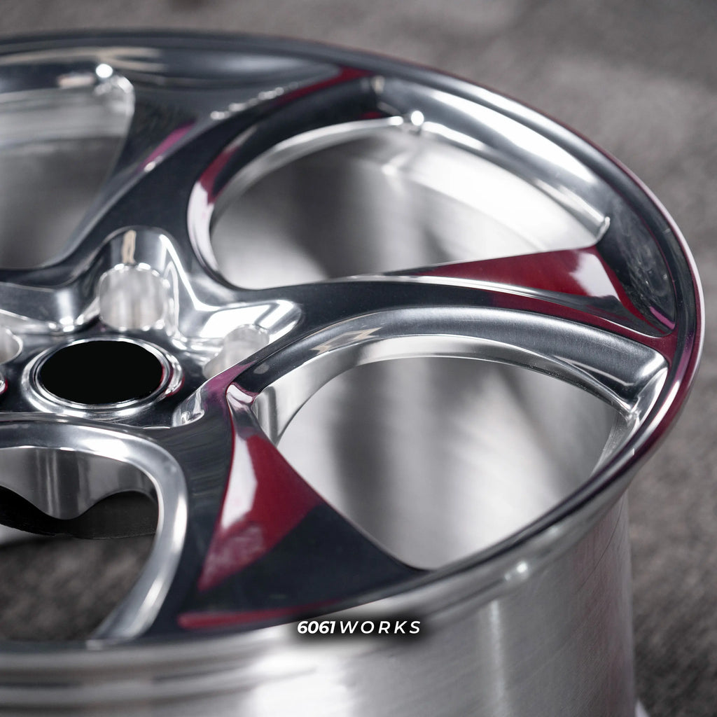 Porsche Taycan 21 inch custom forged wheels | 522M style Polished finish, detailed macro view on polished aluminum spoke contours and outer rim edge
