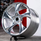 Porsche Taycan 21 inch custom forged wheels | 522M style Polished finish, dynamic side-angle view highlighting deep concave face and polished finish