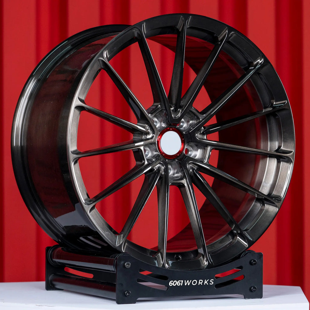 Custom forged wheels Anrky AN19 style for Rolls Royce Dawn 22 inch | Brushed with Dark Coating front view on stand