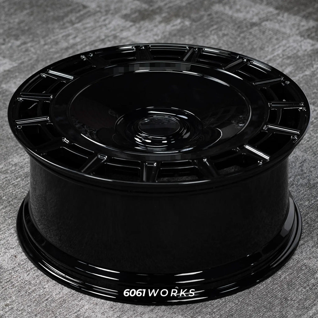 Rolls Royce Phantom 24 inch custom forged wheels | Mansory FD.15 style Gloss Black, angled profile display view on stand