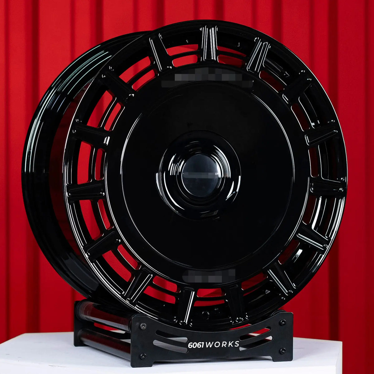 Rolls Royce Phantom 24 inch custom forged wheels | Mansory FD.15 style Gloss Black, double wheel setup display view on red backdrop
