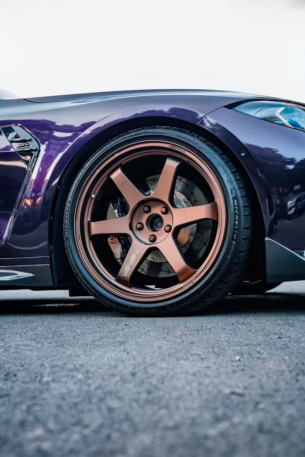 Volk TE37 style forged monoblock wheels on BMW M4 G82 — close up fitment
