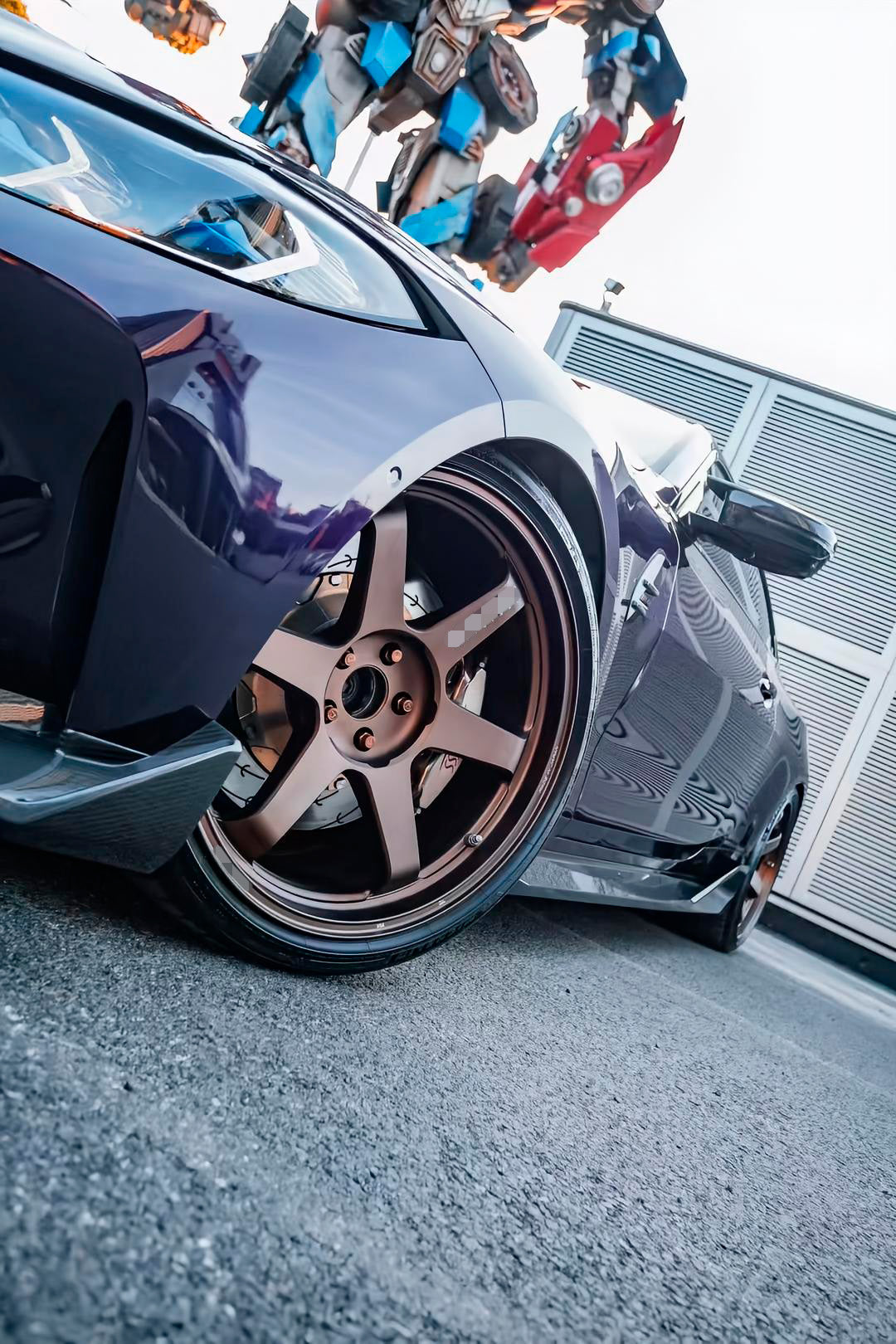 Volk TE37 style forged monoblock wheels on BMW M4 G82 — dynamic angle